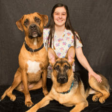 Carly Logan with two dogs